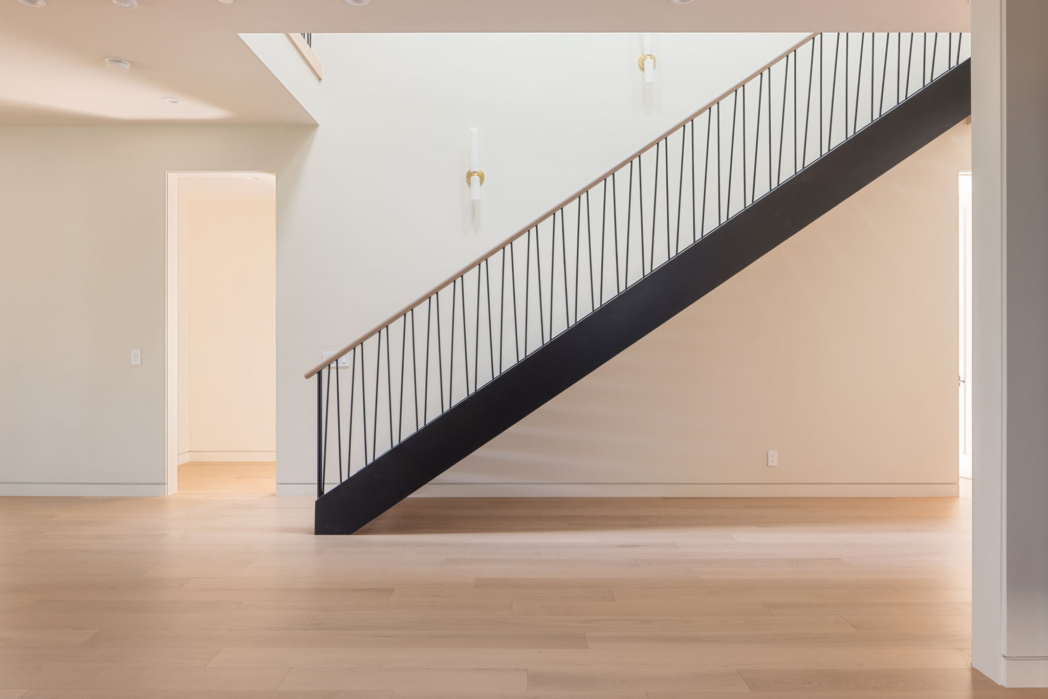The Alder House floating staircase with black rail