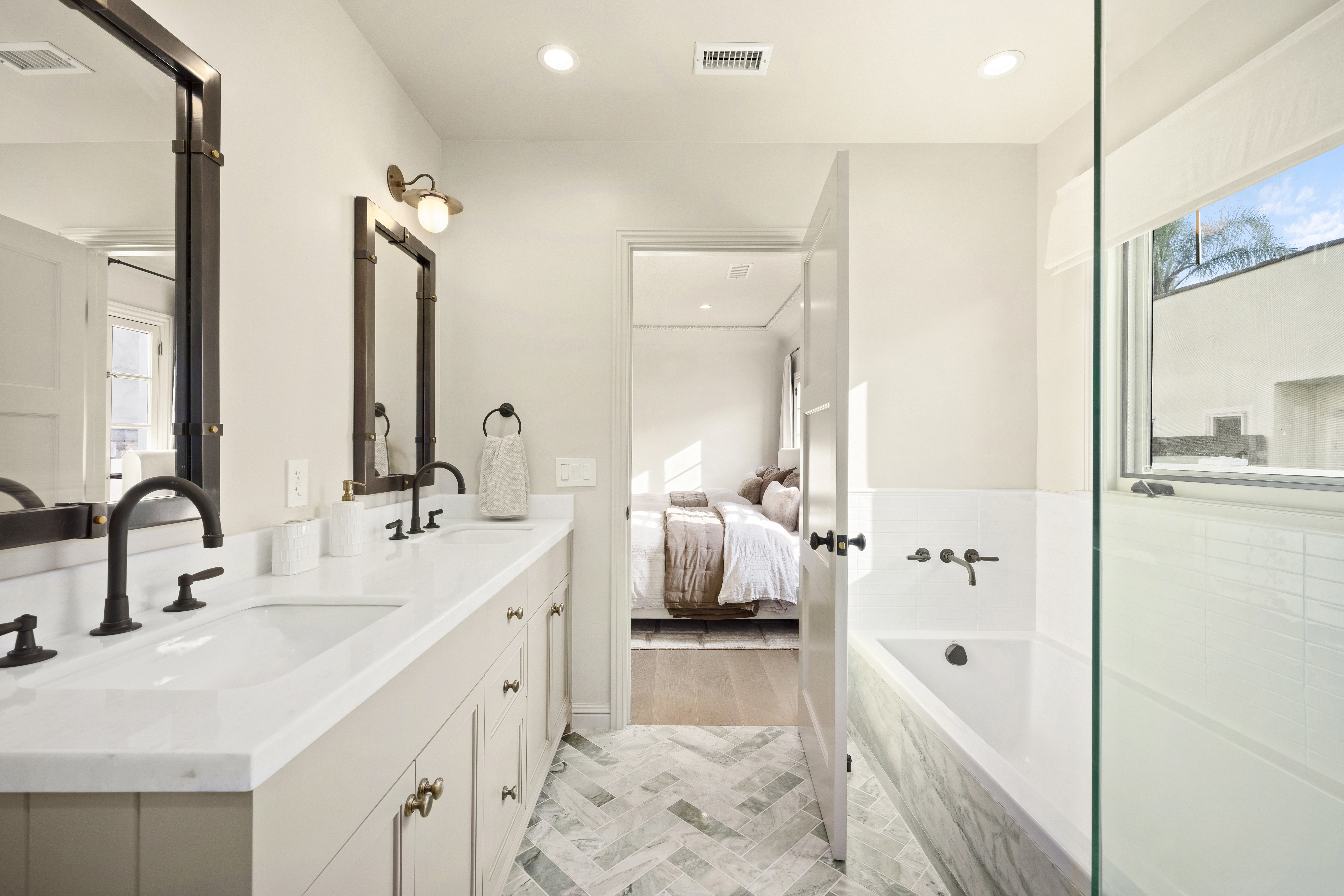 Casa Lista primary bath double vanity and soaking tub