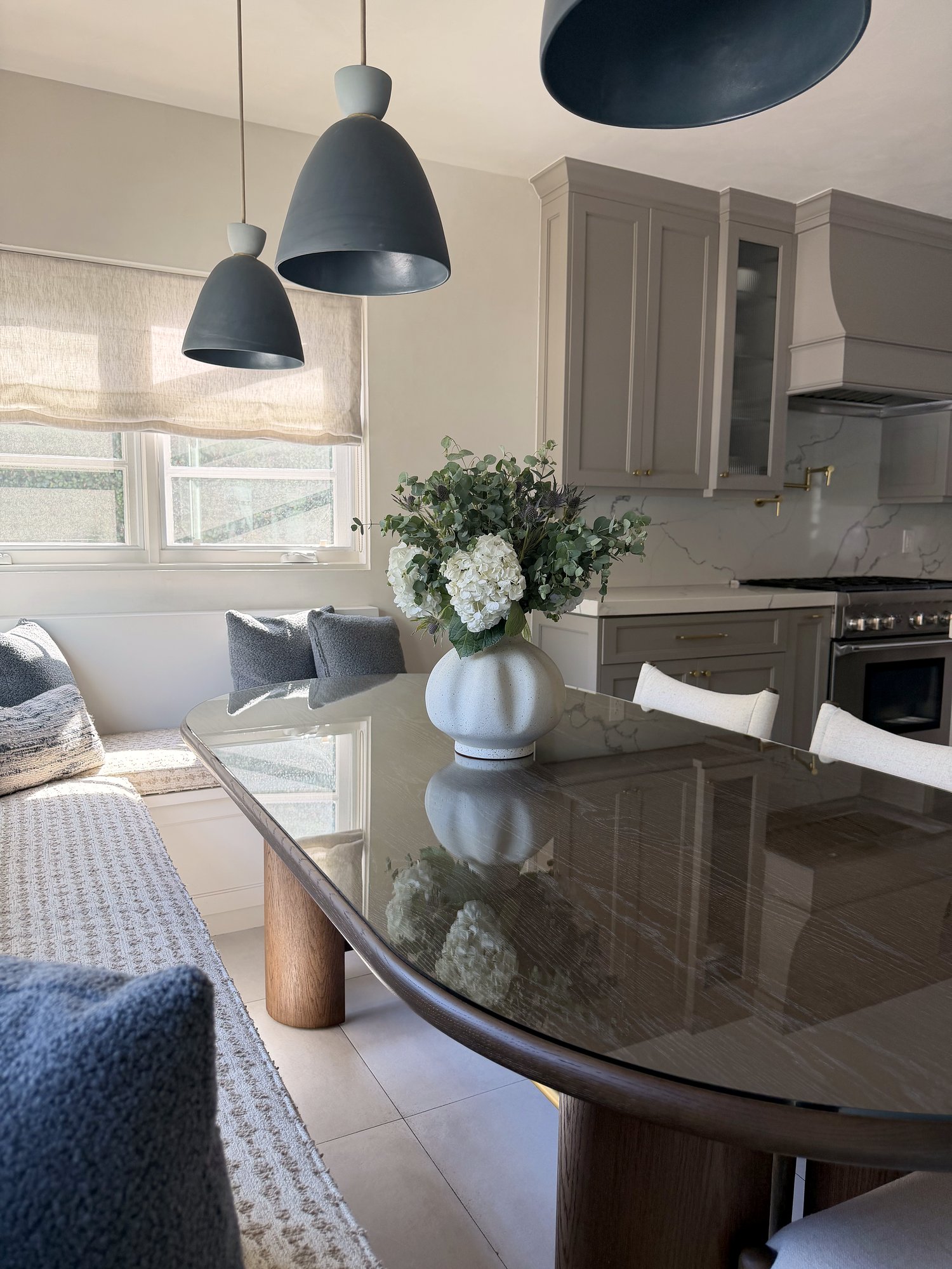The Daily Table breakfast nook close view with black pendant lights