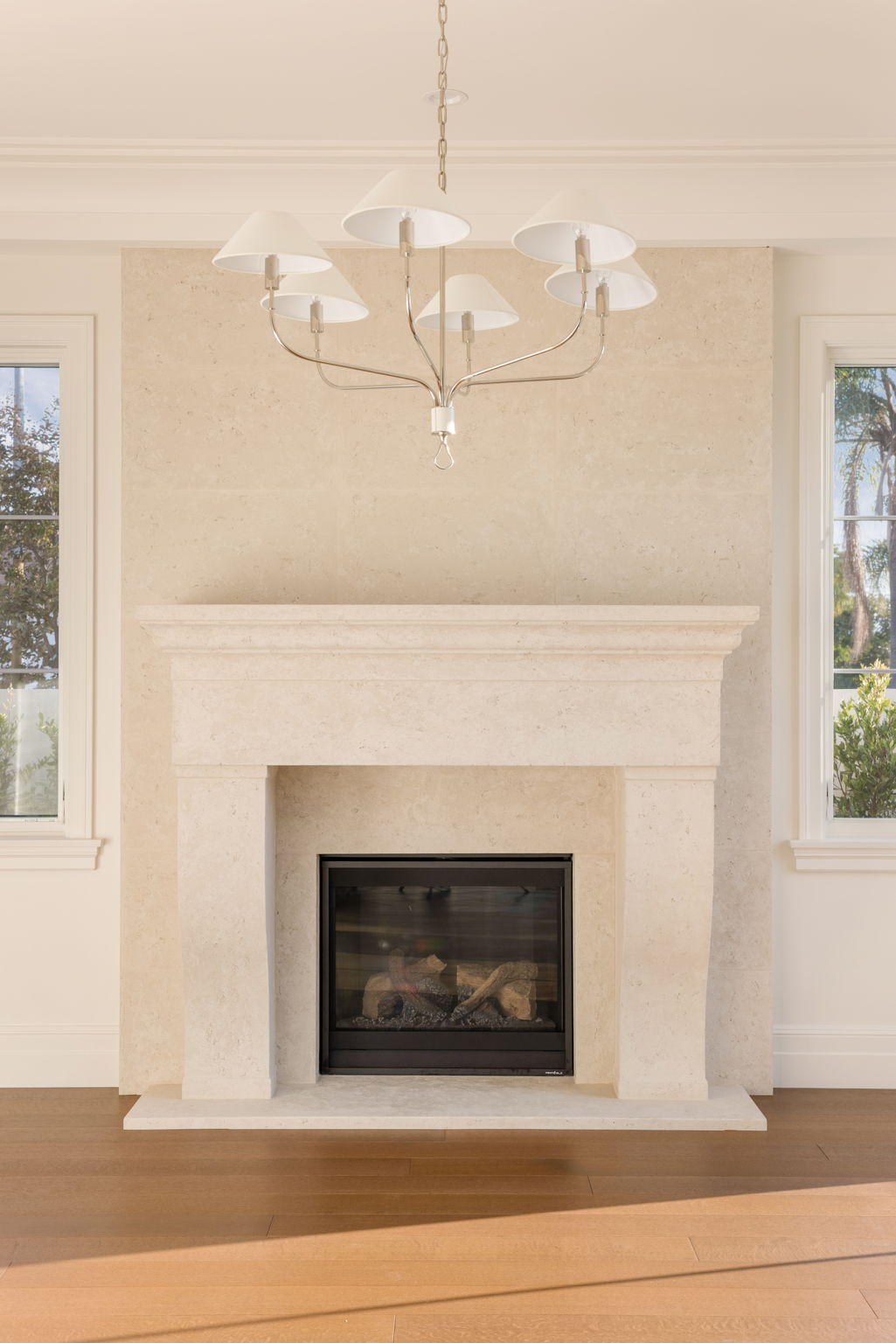 The Magnolia House living room stone fireplace mantel detail