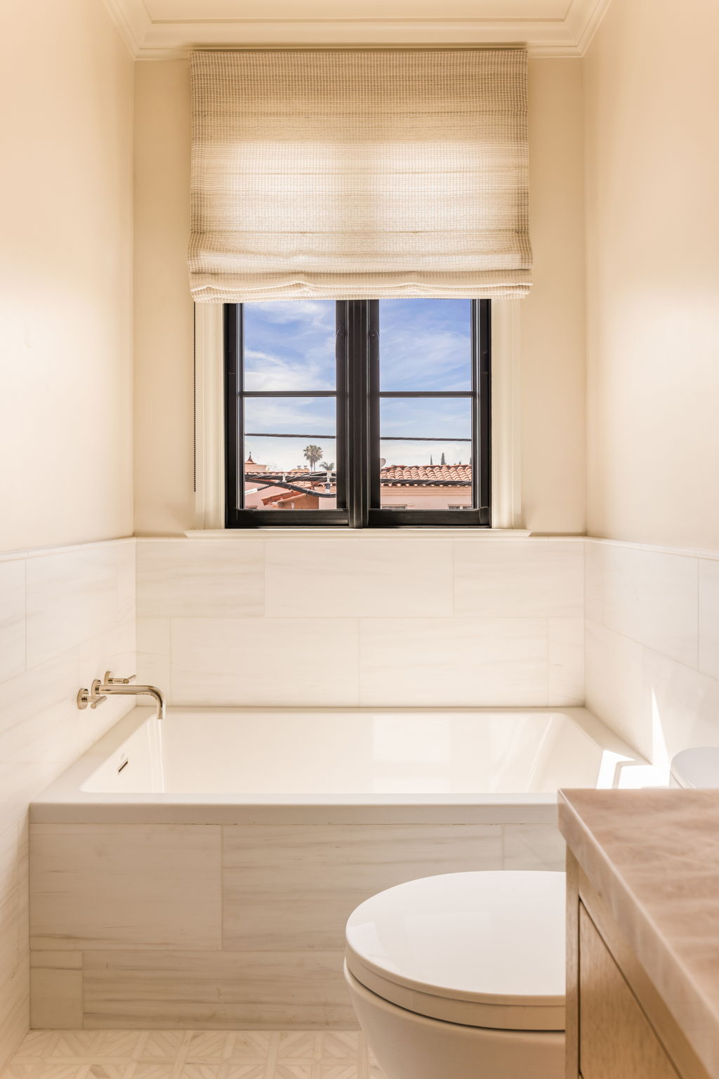 The Thistle House guest bath tub under window