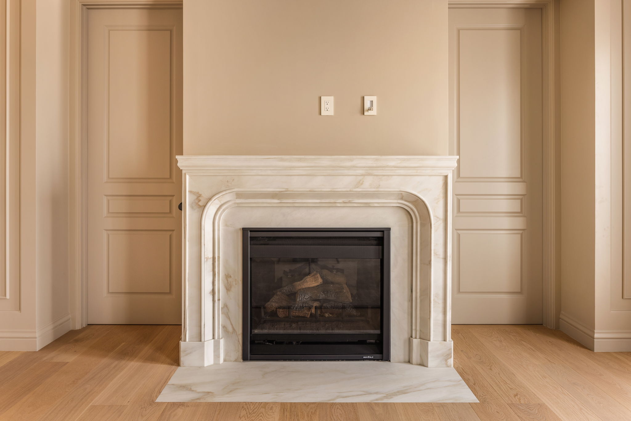 The Thistle House living room marble fireplace mantel